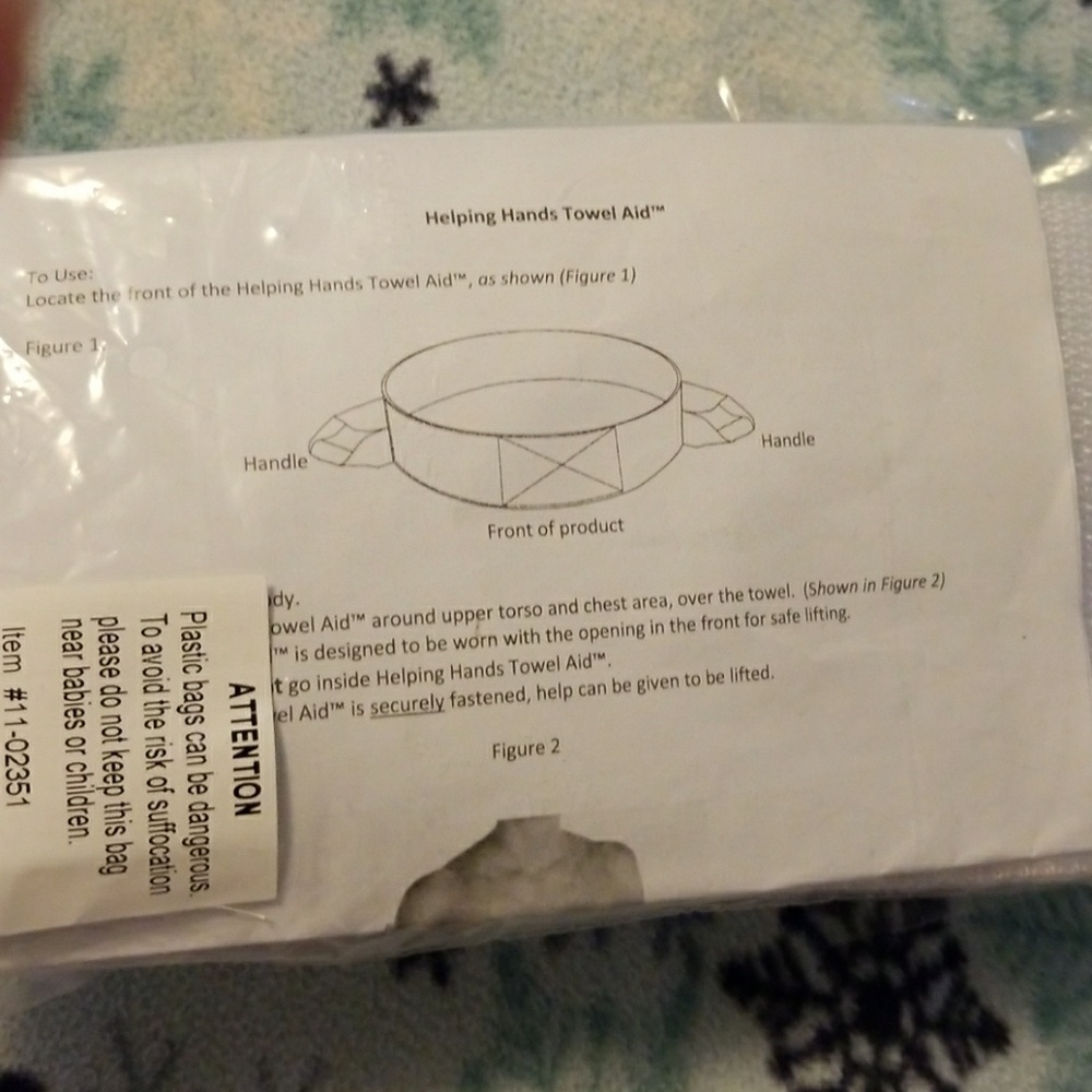 Helping hand towel aid